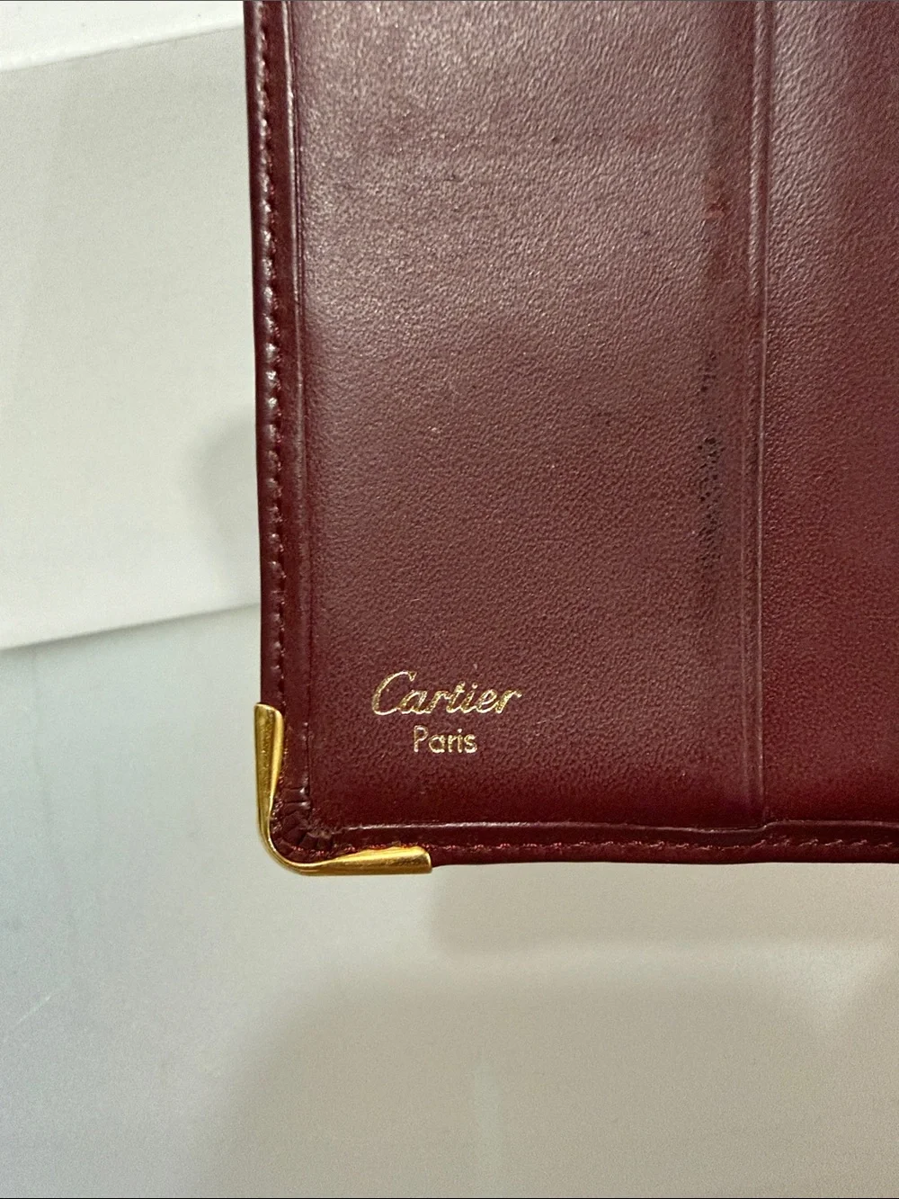 Cartier Must de Cartier Leather Bifold Wallet in Burgundy with Gold Corners